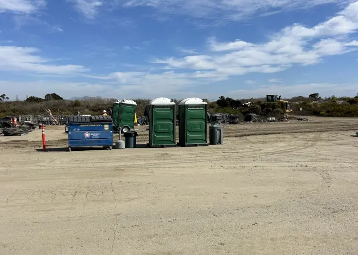 portable toilets on jobsite in huntington beach, ca